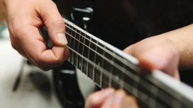 Guitar keeps slipping off lap